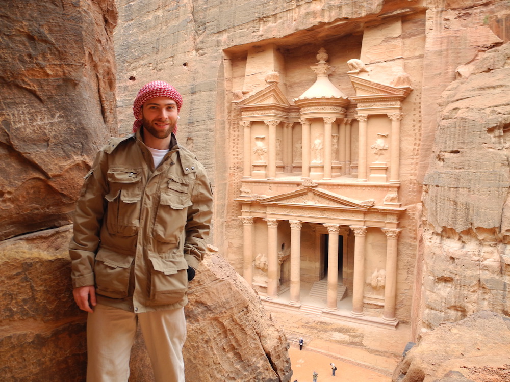 a man traveling to petra