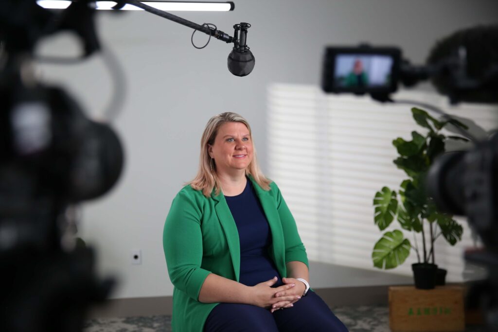 client sits down for a corporate interview for chroma house a miami video production company